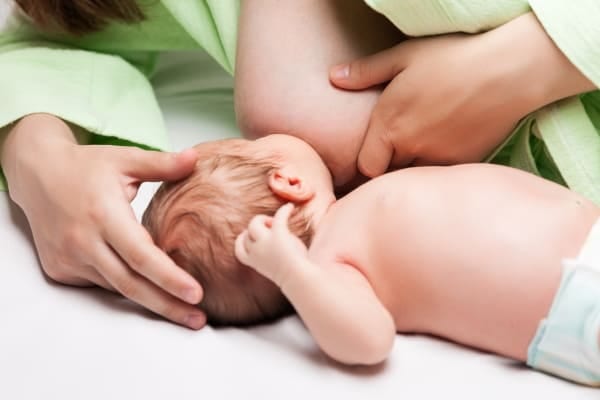 Lay down baby breastfeeding